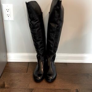 Made in Italy. Beautiful leather boots. Above the knee. Size 7 (US). Black